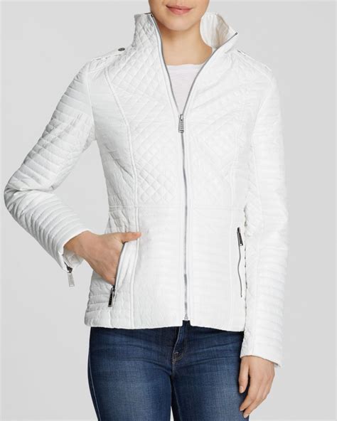 off white quilted jacket.